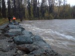 Armour rock placed to try and hold back the water