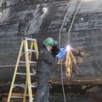 Welding on the side of the M/V Susitna