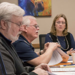 Assembly Member Dan Mayfield with Assembly Member Ted Leonard on right and in background, State Rep. Colleen Sullivan-Leonard